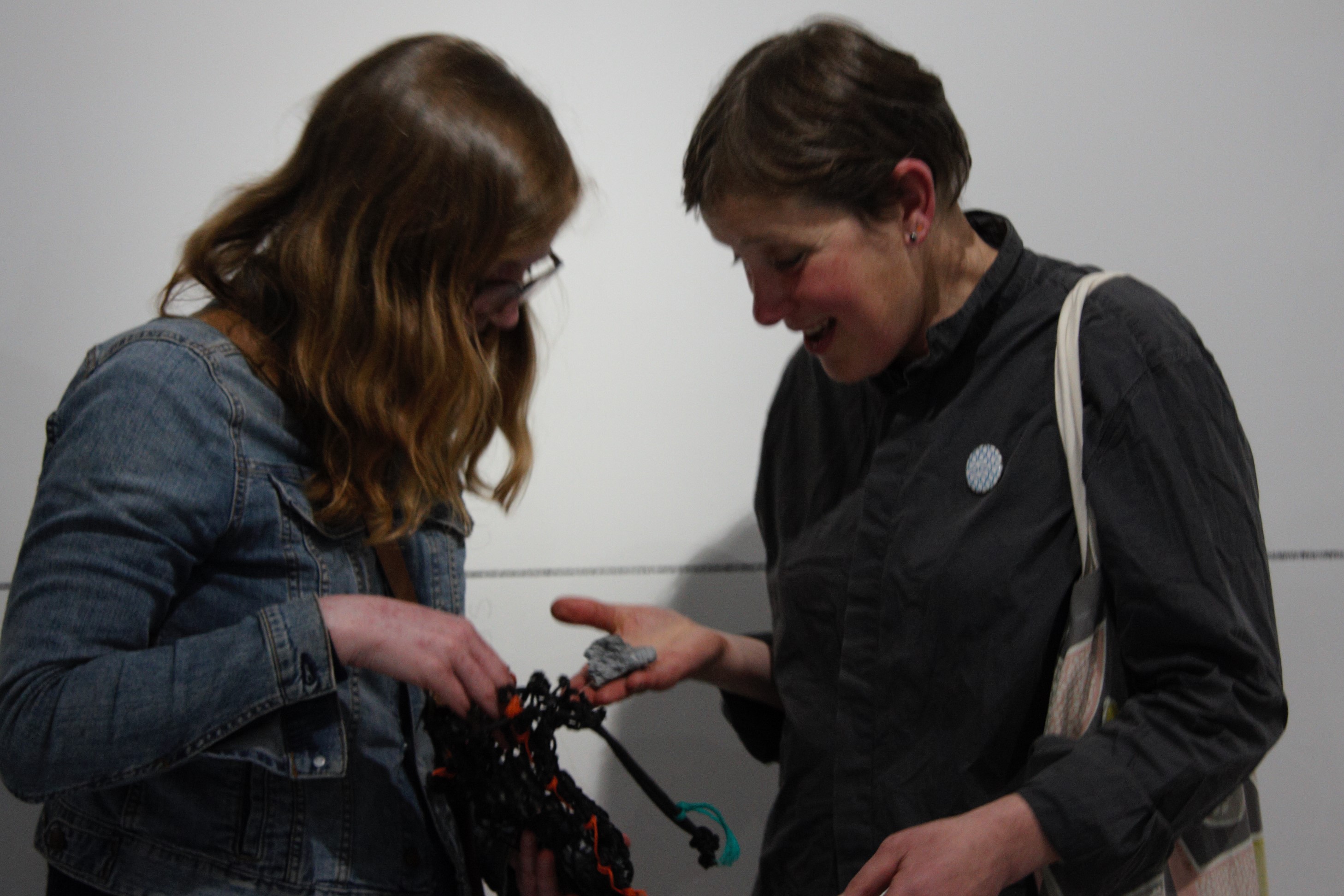 audience member bringing sample to ident